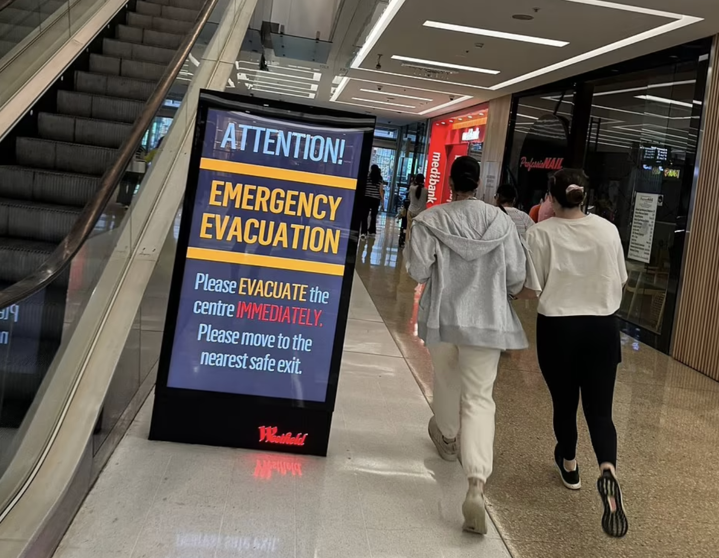 Emergency evacuation sign in a Westfield shopping centre